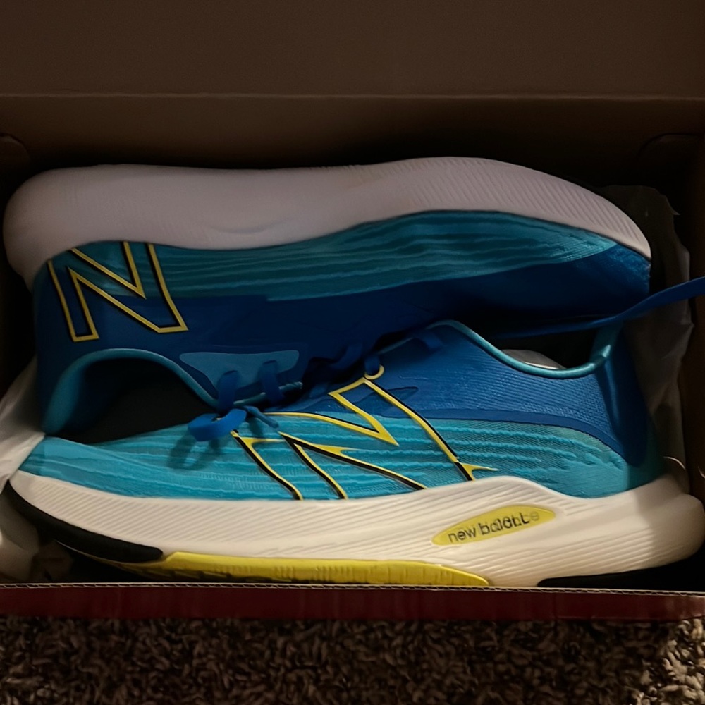 Blue new balance sneakers ! Bran new ! Never worn in original box!!